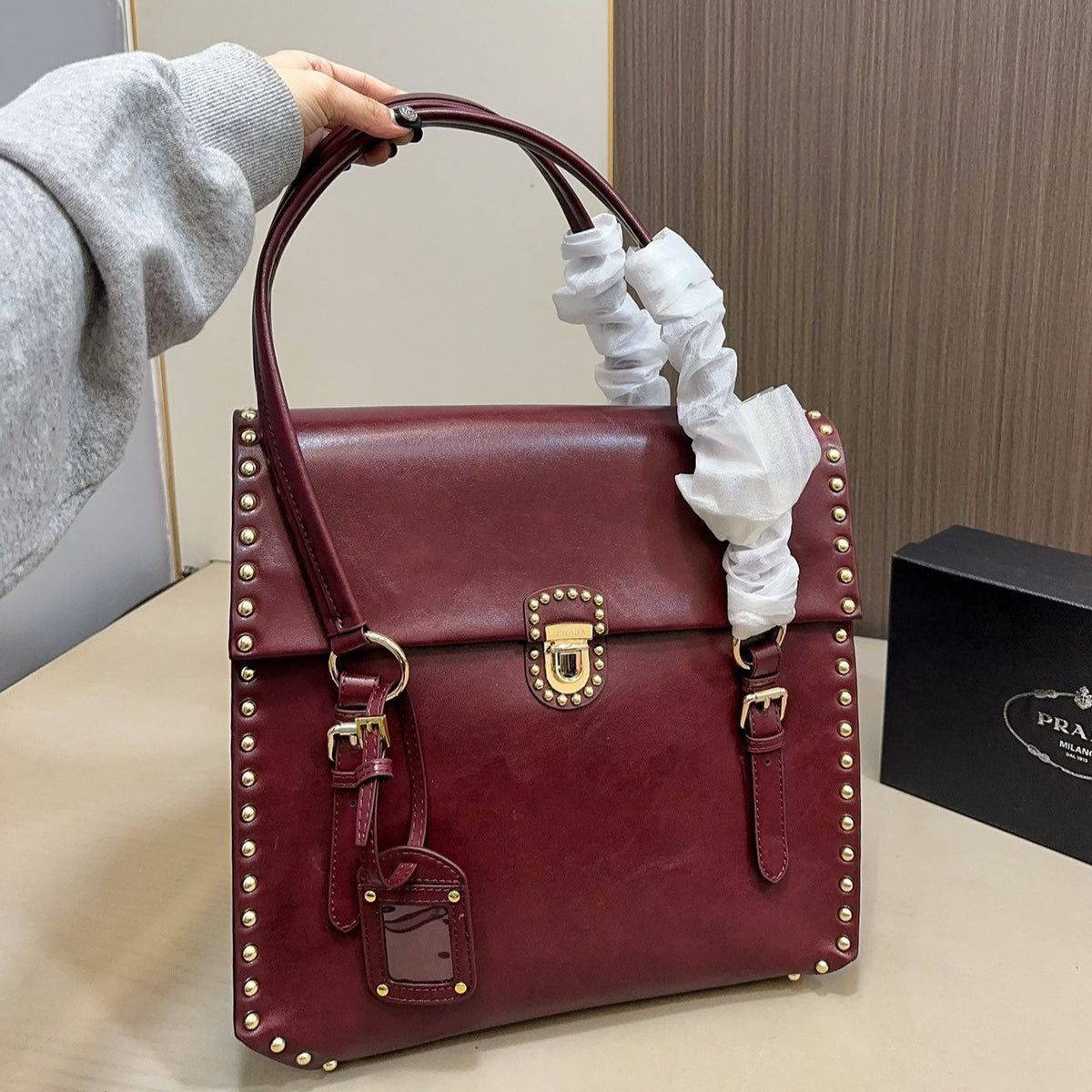 STUDDED TOP HANDLE BAG 33 IN BURGUNDY RED SMOOTH CALFSKIN