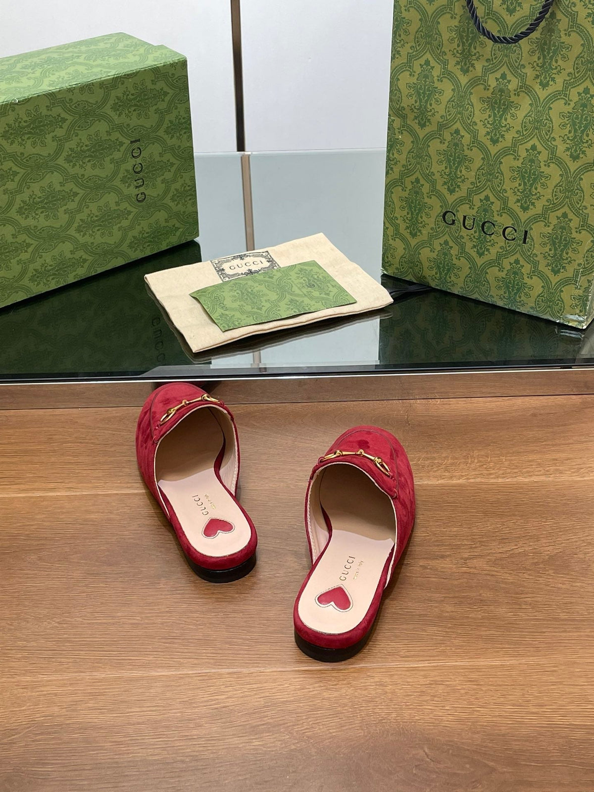 HORSEBIT MULE IN CHERRY RED SUEDE WITH GOLD HARDWARE