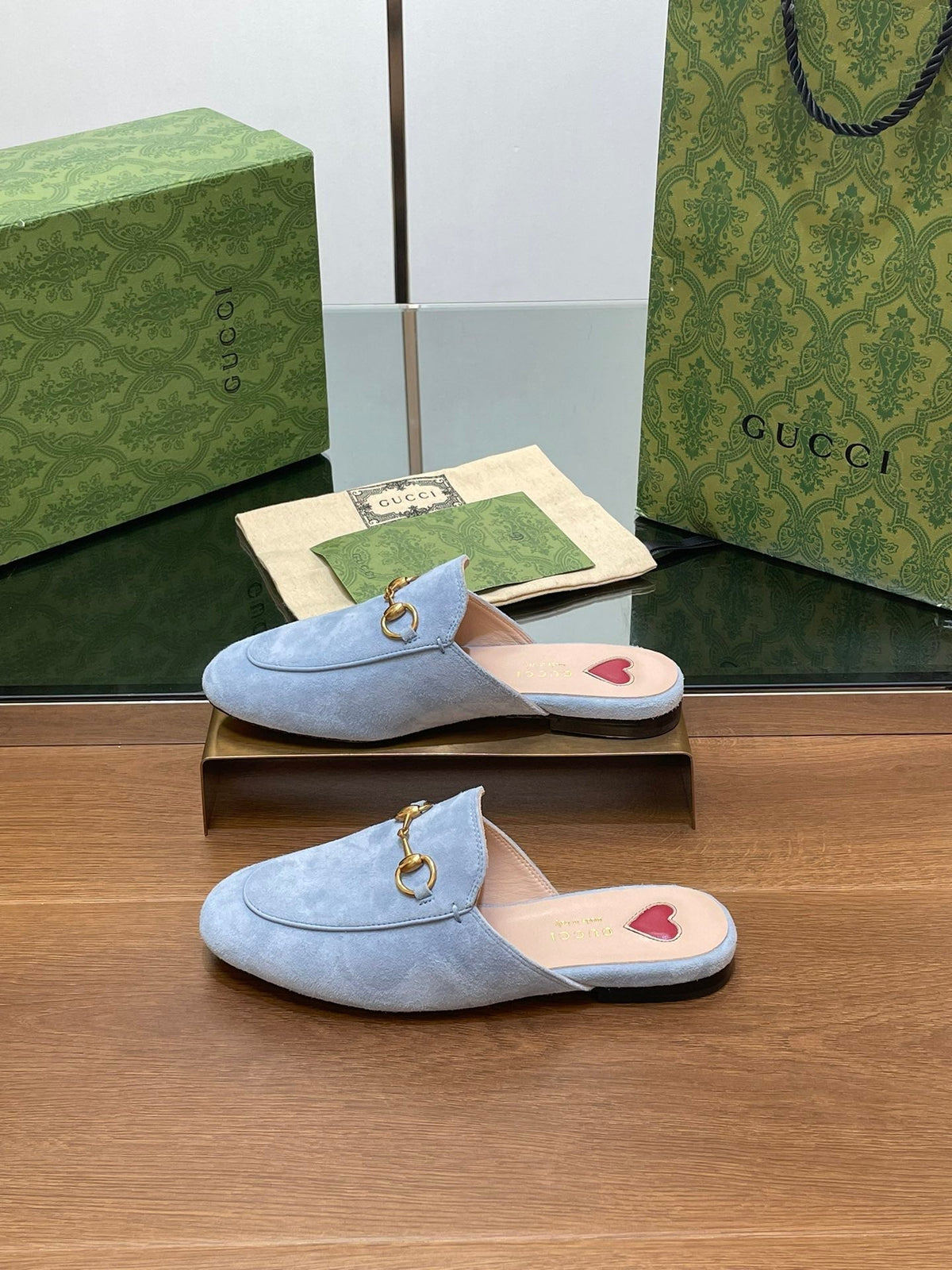 HORSEBIT MULE IN LIGHT BLUE SUEDE WITH GOLD HARDWARE
