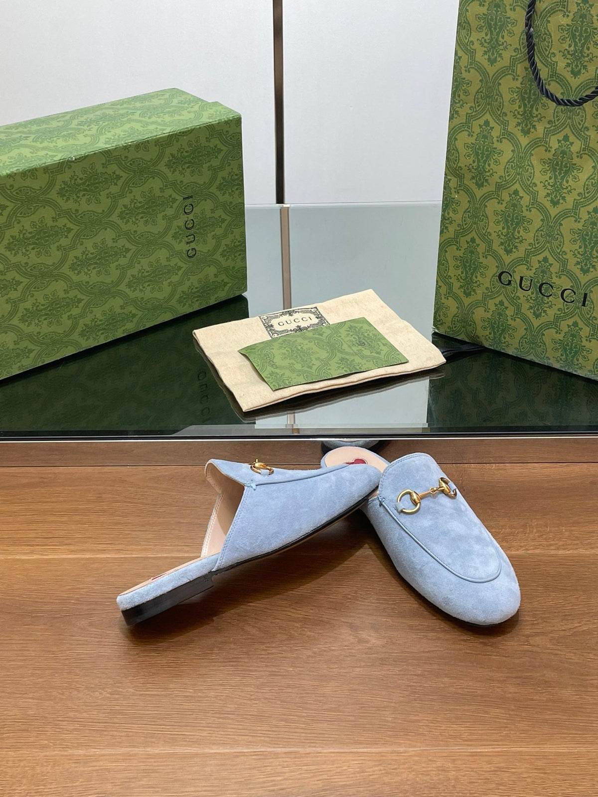 HORSEBIT MULE IN LIGHT BLUE SUEDE WITH GOLD HARDWARE