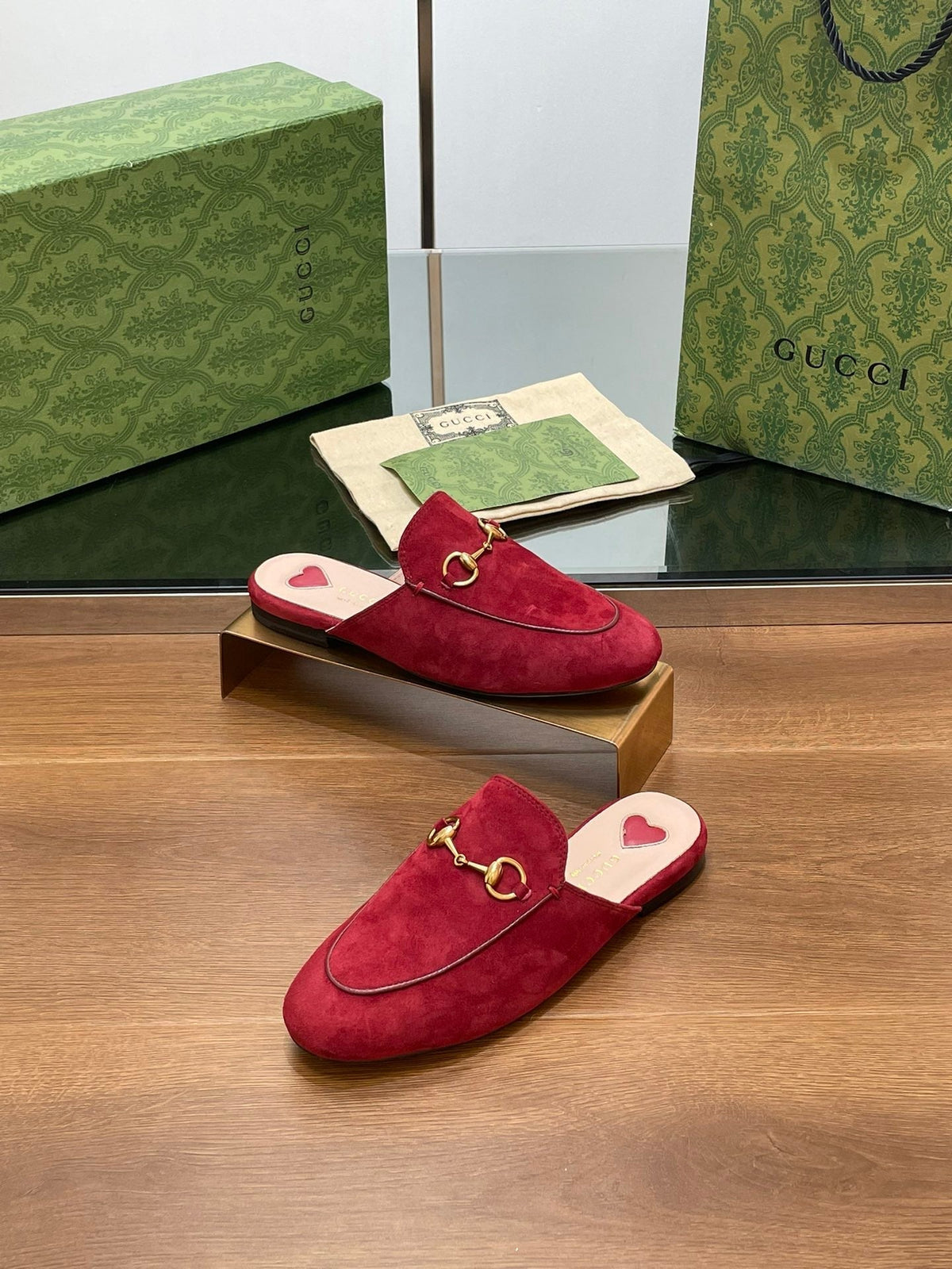 HORSEBIT MULE IN CHERRY RED SUEDE WITH GOLD HARDWARE