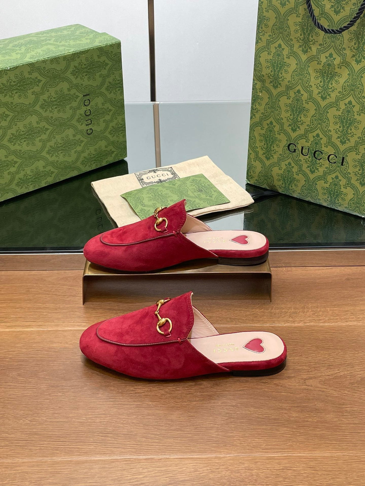 HORSEBIT MULE IN CHERRY RED SUEDE WITH GOLD HARDWARE