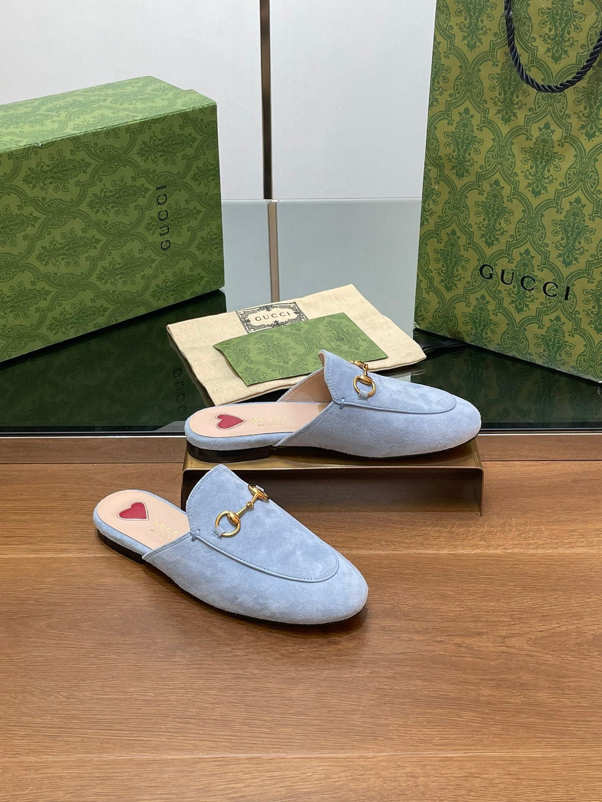 HORSEBIT MULE IN LIGHT BLUE SUEDE WITH GOLD HARDWARE